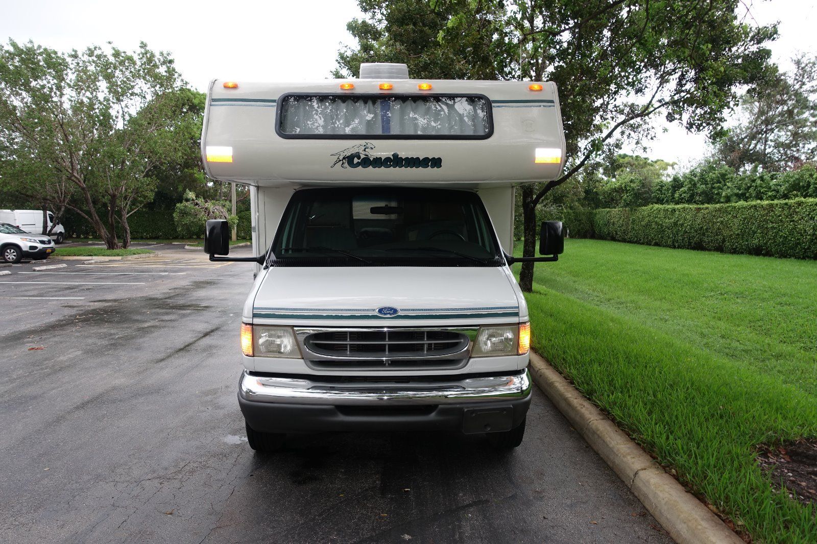 Head-on front view showing the Ford E350 cab