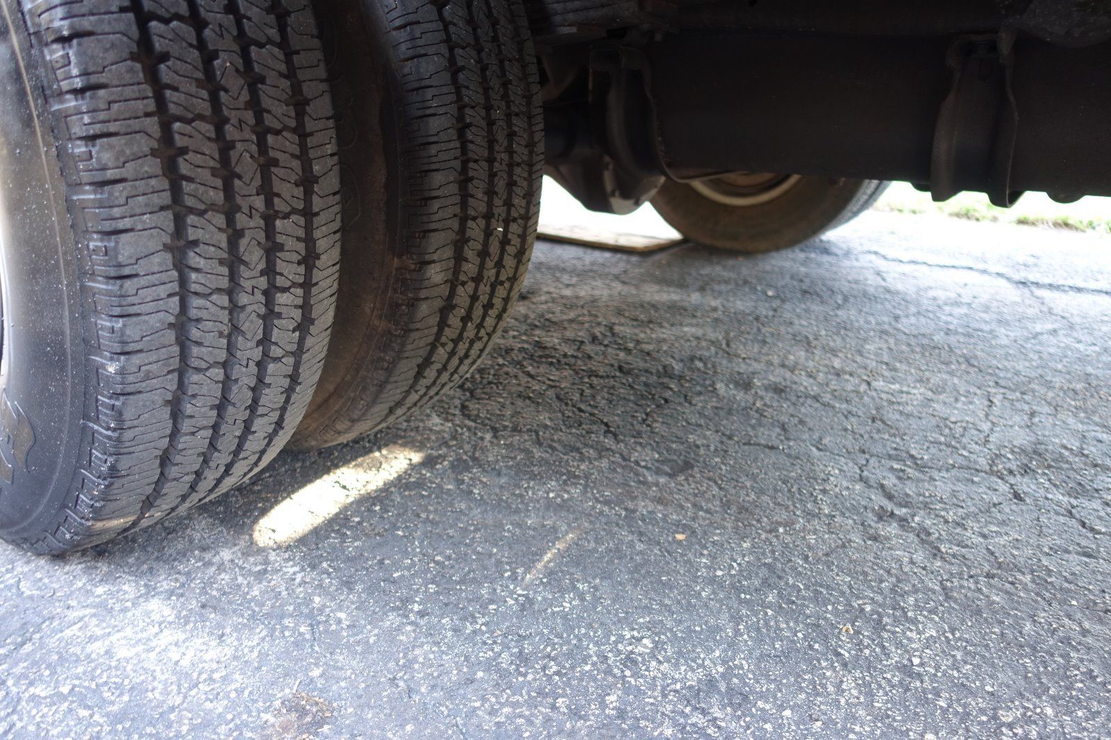 Firestone rear dual tires and clean undercarriage